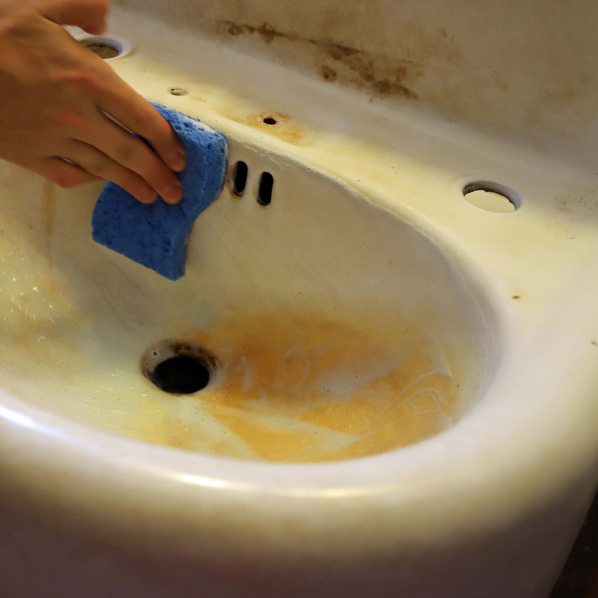 How to clean and remove stains from an old cast iron sink